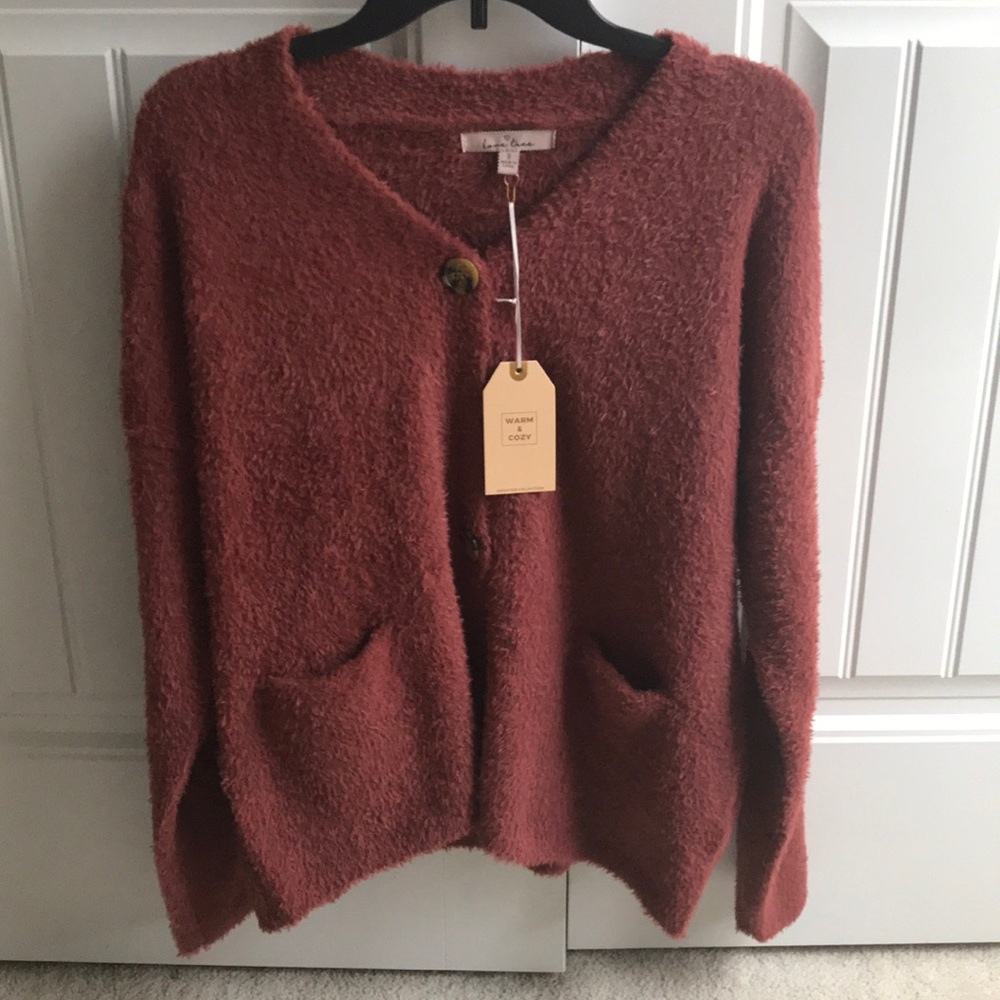 Women’s Lane tree button down sweater.